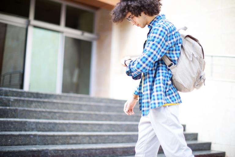 Young man is late to the school. time-blindness and management concept