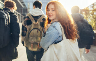 female-student-with-her-friends-going-to-traditional-school