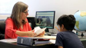 student and teacher working one on one with each other at The Tenney School