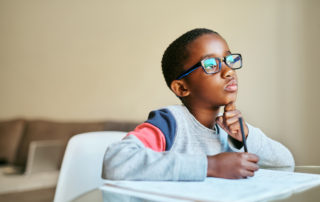 boy-thinking-while-doing-homework-critical-thinking