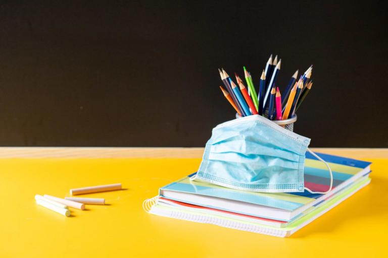 Mask on a School Desk