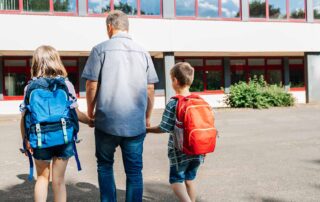 A family attending a school tour.